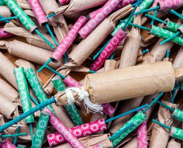 Aerial view of a messy pile of different types of firecrackers.