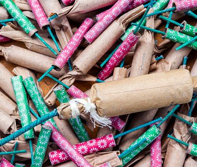 Aerial view of a messy pile of different types of firecrackers.